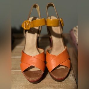 Platform ankle strap heel.